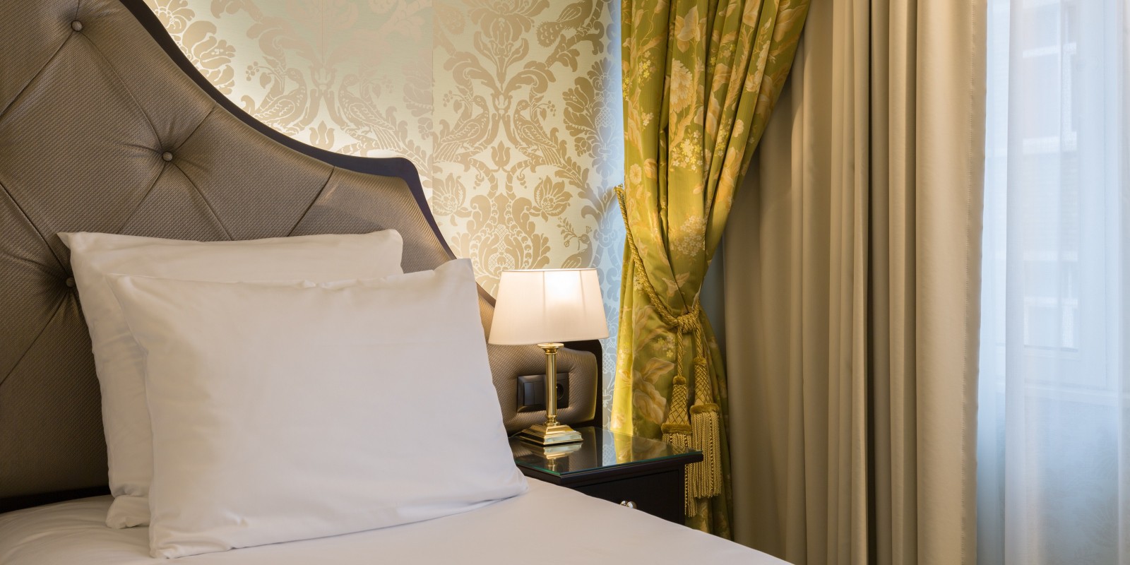 Pute på sengen i classic room twinpå Stanhope Hotel i Brussel