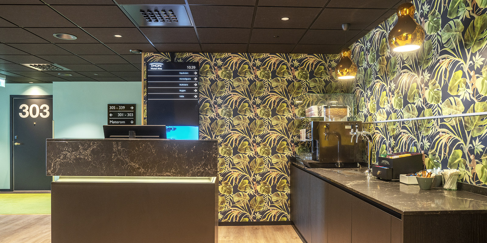 Pauseområde med kaffemaskin og enkel servering for våre konferansegjester