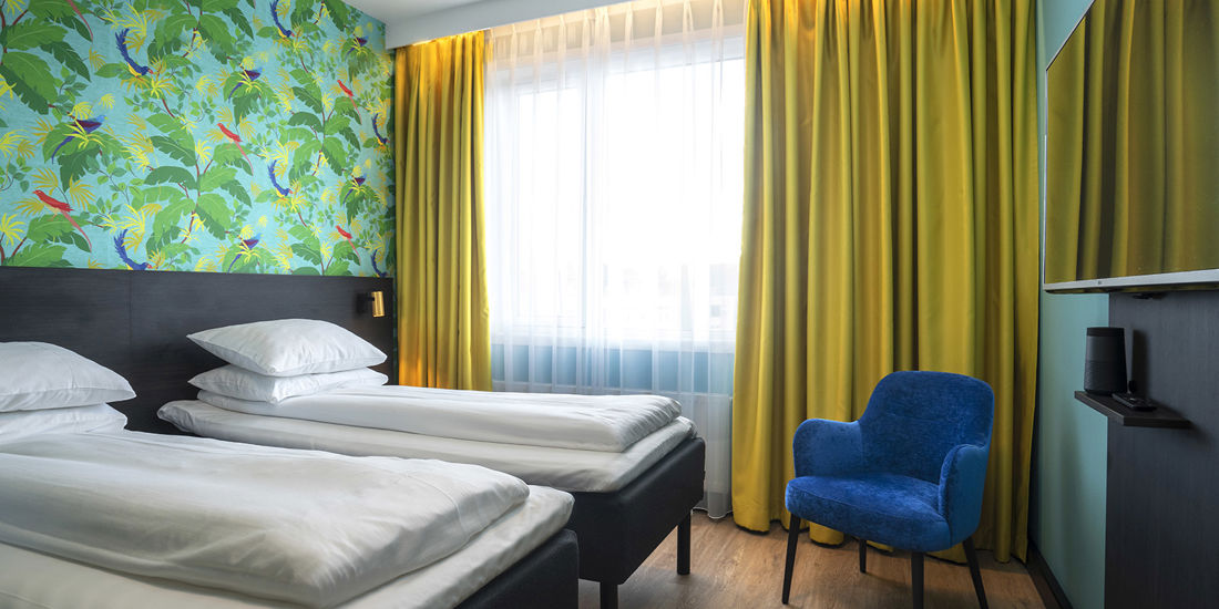 Seng i twinrom på Thon Hotel Alta