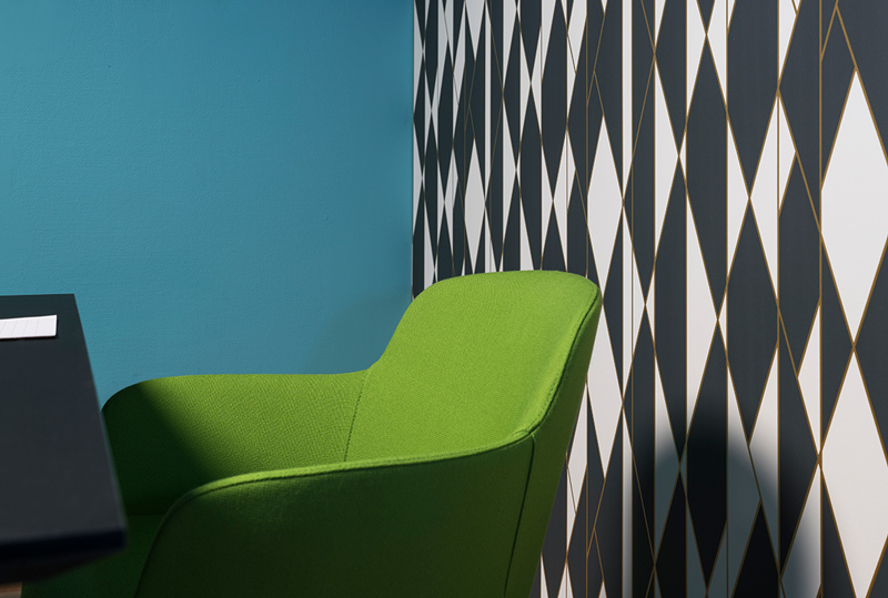 Detaljbildet av en grønn stol