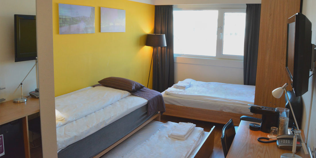 Kombirom med plass til fire personer på Thon Hotel Kristiansand