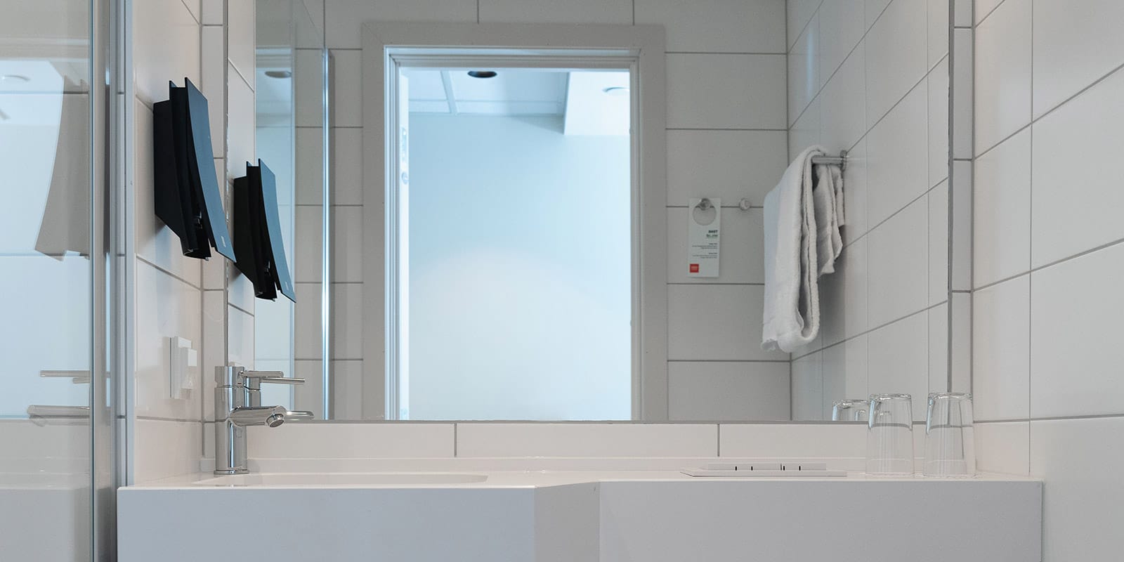 Vask med såpe på badet i standardrom på Hotel Norge