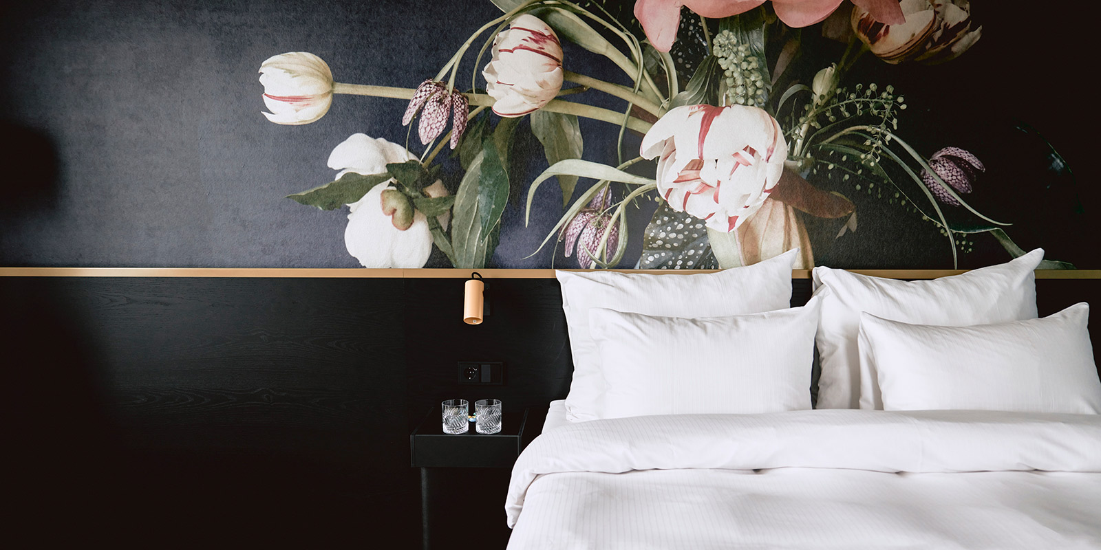 Utsnitt av suite med seng p&#xE5; thon hotel svolvar