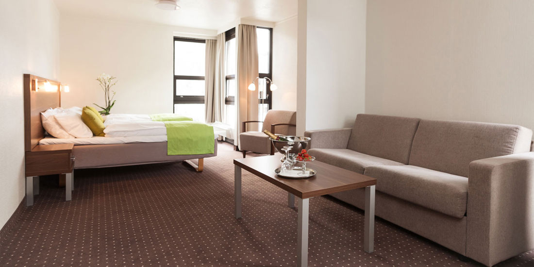 Seng i businessrom på Thon Hotel Otta
