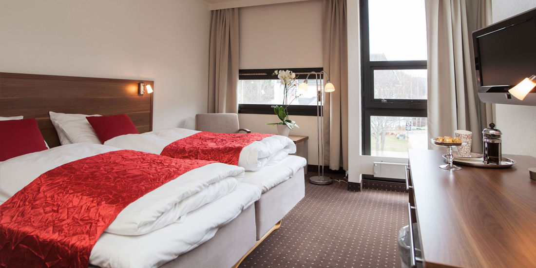 Seng i familierom på Thon Hotel Otta
