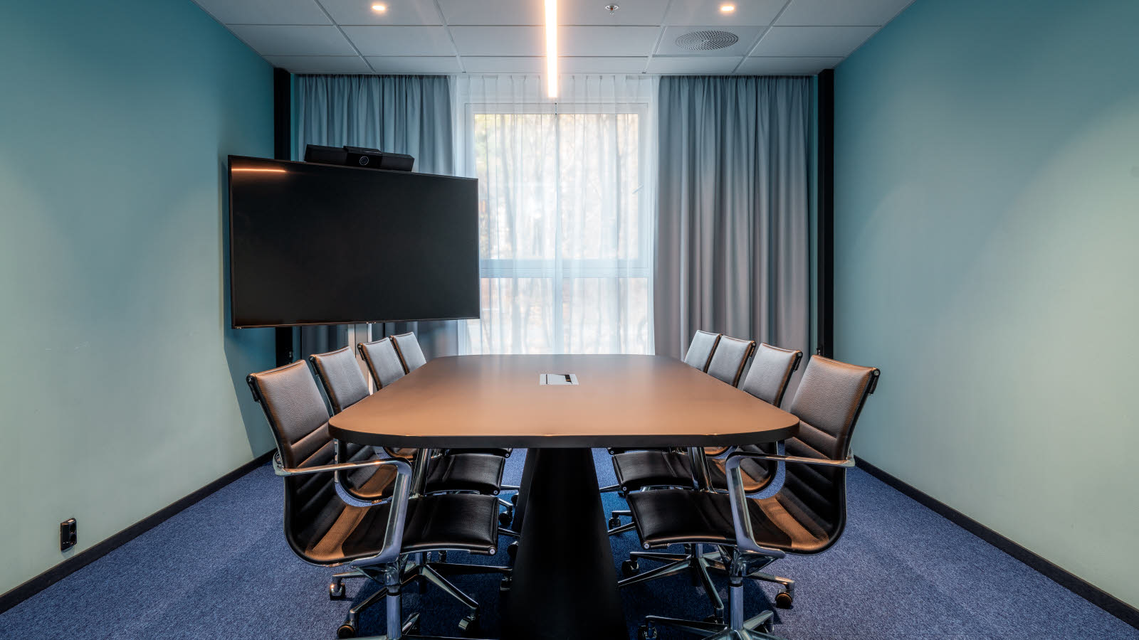 Detaljbilde av Thon Hotels penn og notatblokk