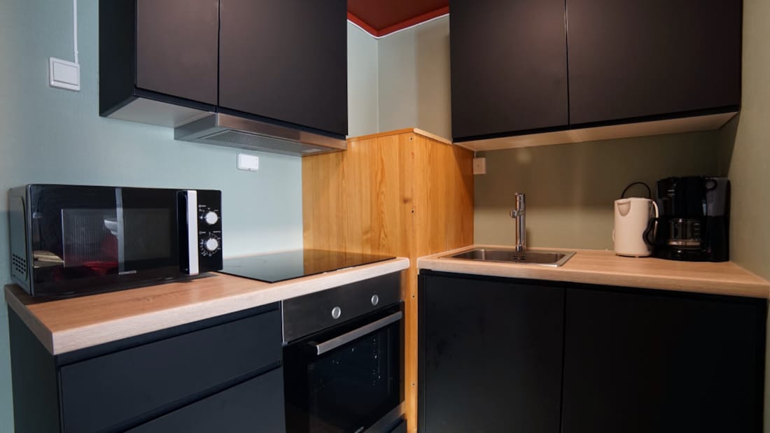 Fullt utstyrt kjøkken i to-roms leilighet ved Thon Hotel Skeikampen