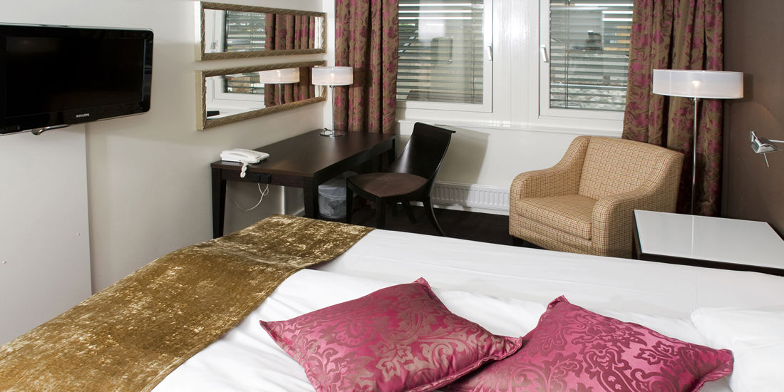 Seng i queenrom på Thon Hotel Prinsen i Trondhiem