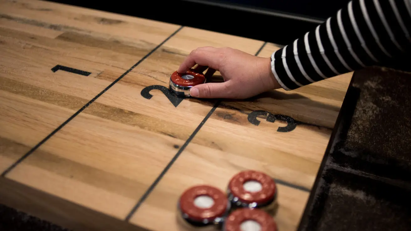 Shuffleboard spill